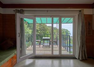 Balkón nebo terasa v ubytování RoseDew Villa