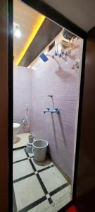 Koupelna v ubytování Gharaunda Homestay + 4 fotografie