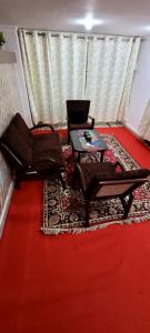 Posezení v ubytování Gharaunda Homestay