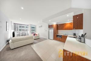 Kuchyň nebo kuchyňský kout v ubytování Pretty Penthouse - Close to ANU