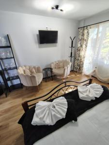 Postel nebo postele na pokoji v ubytování Стаи за гости - Цветето на Ангела