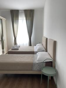 Postel nebo postele na pokoji v ubytování amoR Tempora + 5 fotografií