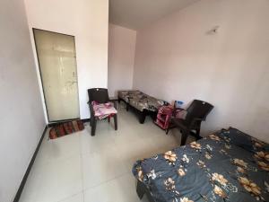 Χώρος καθιστικού στο Rajdeep GUESTHOUSE