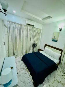 Ένα ή περισσότερα κρεβάτια σε δωμάτιο στο Palmstone Residence +5 φωτογραφίες