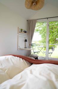 Postel nebo postele na pokoji v ubytování Studio Mini