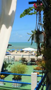 a view of the beach from the balcony of a resort at Ponta Negra Suites & Apart in Natal +166 photos