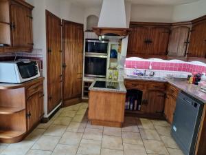 Kuchyň nebo kuchyňský kout v ubytování Chambre Jura 2 près de CERN et Genève