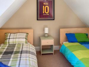 Voodi või voodid majutusasutuse Old Laurel Cottage toas