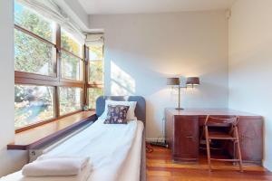 En eller flere senge i et værelse på Rose Residence 2 Bedrooms, Terrace, Parking