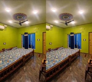 Postel nebo postele na pokoji v ubytování Nimishamba Comforts