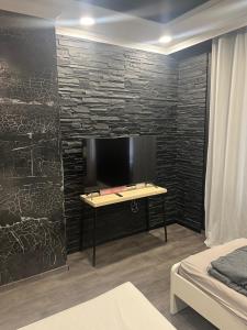 TV a/nebo společenská místnost v ubytování Hannover