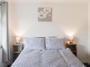 Postel nebo postele na pokoji v ubytování Mountjoy