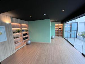 a room with a wine cellar with wooden cabinets at La Foret in Lima +13 photos