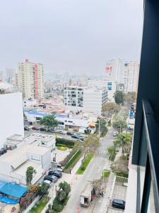 a view of a city from a building at La Foret in Lima