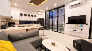 TV a/nebo společenská místnost v ubytování Villa MORGAN