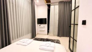 Postel nebo postele na pokoji v ubytování Villa MORGAN