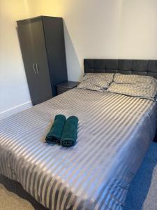 Ένα ή περισσότερα κρεβάτια σε δωμάτιο στο Flat 9 - Epsom High Street