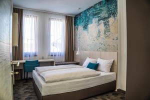 Postel nebo postele na pokoji v ubytování Hotel Kapetanovina + 37 fotografií