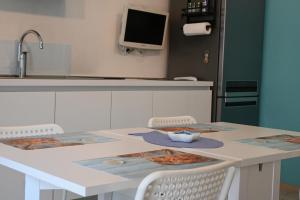 Kuchyň nebo kuchyňský kout v ubytování P052 - Porto Recanati, nuovo bilocale a due passi dal mare