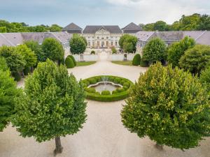 an aerial view of a large house with a garden at Knappenstöckl in Halbturn