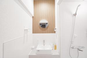 Koupelna v ubytování Kotori Hinoki + 49 fotografií