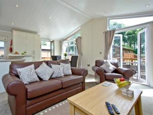 Posezení v ubytování Forest Glade Lodge