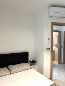 Postel nebo postele na pokoji v ubytování Modern apartment - Salento Guest House