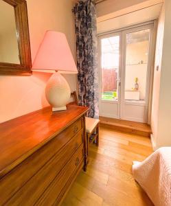 Postel nebo postele na pokoji v ubytování Le 84 ! Appart' calme et spacieux en centre ville