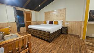 Postel nebo postele na pokoji v ubytování Shiva Den