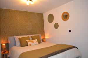 Ένα ή περισσότερα κρεβάτια σε δωμάτιο στο Lavand'in Durbuy