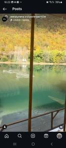 a view of a lake from a train window at Pablo's place in Rezine +7 photos