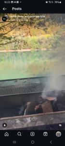 a picture of a grill with smoke coming out of it at Pablo's place in Rezine