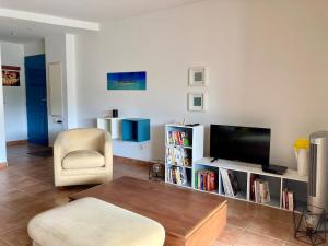 TV a/nebo společenská místnost v ubytování T2 Le Marisol Pool-Beach