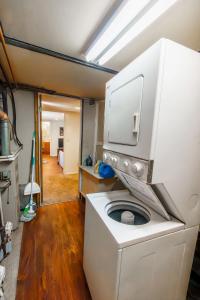 a washer and dryer in a room at 1 Bed Apt - Amazing Location 1 Block to Carson St in Pittsburgh