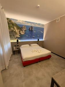 a bedroom with a bed with a view of the ocean at Jet Hotel, Sure Hotel Collection by Best Western in Gallarate