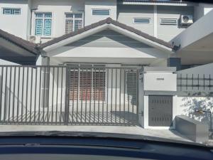 a gate in the front of a house at The Diana Residence Muar in Muar