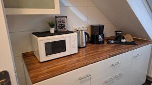 Η κουζίνα ή μικρή κουζίνα στο CityStay Wolfsburg - GTI