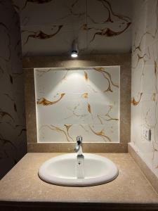 Koupelna v ubytování Paradise guest house + 13 fotografií