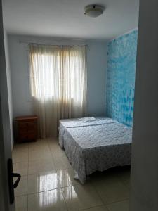 Postel nebo postele na pokoji v ubytování Tenerife Sur Relax