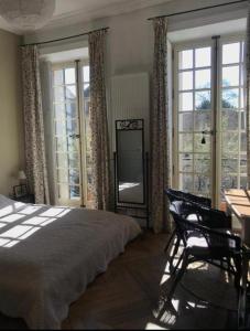 Postel nebo postele na pokoji v ubytování Chambre d'hôte du Château