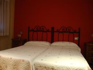 A bed or beds in a room at El Molin de Eloy