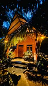 Aed väljaspool majutusasutust Ama Eco Lodge