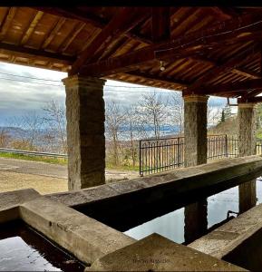 a bridge over a body of water at Le coste sul lago in Montefiascone