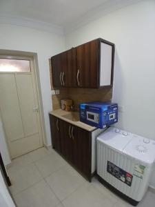 Η κουζίνα ή μικρή κουζίνα στο شقق للايجار اليومي و الشهري