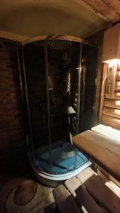 a glass shower in a room with a table at Gierkówka - Górska Rezydencja Pierwszego Sekretarza in Zwardoń +38 photos