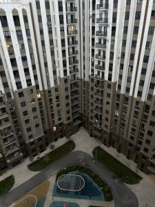 an aerial view of tall buildings with a courtyard at Apartments in Tashkent Uzbekistan in Toshkent-Passajir Bekati