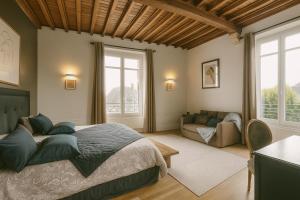 Postel nebo postele na pokoji v ubytování Maunoury Citybreak