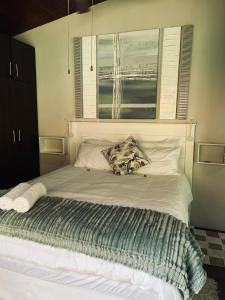 Ένα ή περισσότερα κρεβάτια σε δωμάτιο στο Place on Lichfield