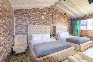 Un pat sau paturi într-o cameră la Hotel Glamping La Polka +288 fotografii