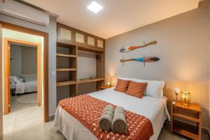 a bedroom with a large bed and a room at Bahia Soul - Casa Bambu - Barra Grande - Península de Maraú in Barra Grande +110 photos